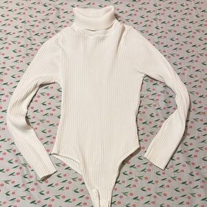 Elegant White Turtleneck Bodysuit